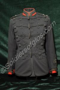 Frogged rifle green tunic with red facings.  Worn