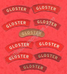 White on red cloth shoulder titles, (two patterns)