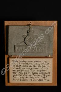 Royal Artillery badge carved in stone by Lieutenan