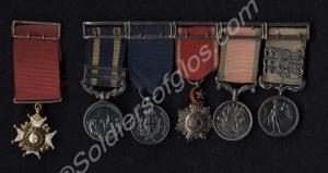 Group of six miniature medals; Military badge and
