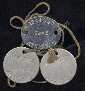 Three metal identity discs. Samples in the name To