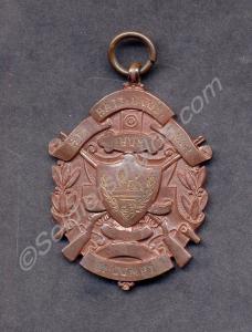 Bronze musketry medal. Awarded to 521 Corporal Wil