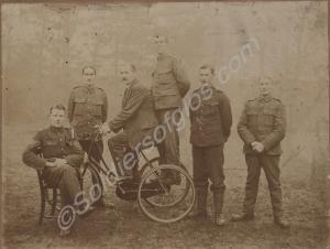 Group of soldiers with man on tricycle 23540 Troop