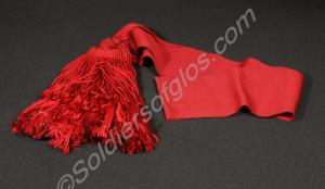 Crimson silk net shoulder sash, as worn by the Glo