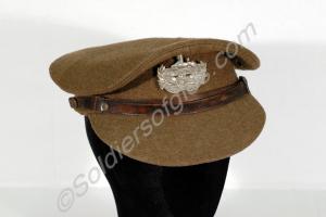 Service dress cap with front and back badges, as w