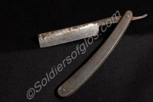 Cut-throat razor. Belonged to Private F.E. Close,