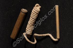 Oil bottle and pull-through for cleaning rifle. c.