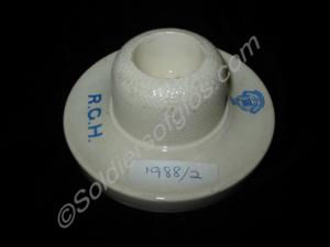 Match holder or ash tray.