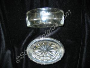 Two oval glass dishes.