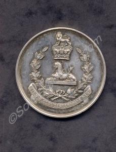Nicholls silver medal presented by C.H. Rainger (a