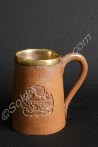 Wooden beer tankard with plated lining, carved wit