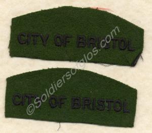 Black on green cloth shoulder title. 601st (M) Hea