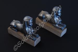 Regimental silver. Two silver sphinxes from candel
