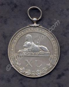 Large white metal medal, from 1st Battalion, South