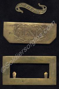 Officer's shoulder-belt buckle and tip of the 61st
