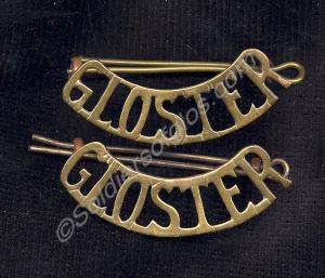 Pair of brass shoulder titles. Gloucestershire Reg