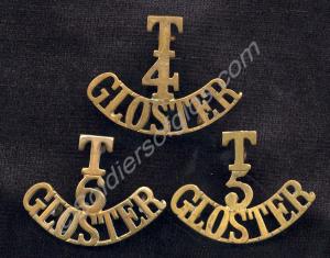 Brass shoulder titles. 4th, 5th and 6th (Territori