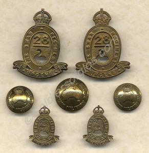 Set of badges and buttons as worn by 28th Battalio