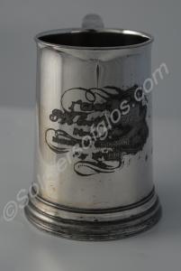 Silver-plated tankard with glass botton engraved "