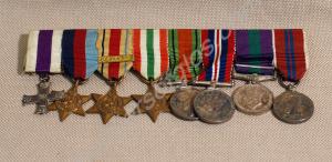 Group of eight miniature medals and ribbon bars; M