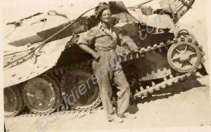 RGH  trooper standing in front of a damaged Crusad