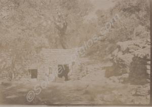 Soldiers outside mud-brick dwelling. India c. 1918