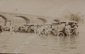 River crossing with cars. India c. 1918.