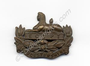 Officer's metal forage cap badge. Small Type.  Glo