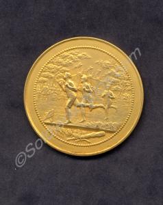 Gilt medallion with the inscription '1st Prize, 1/