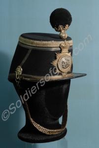 Dark blue kepi with silver lace and furniture, gre