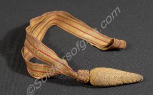 Officer's gold and crimson sword knot.