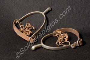 Pair of officer's steel spurs with solid rowells.