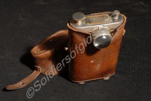 Pocket torch in leather case. Belonging to Major J