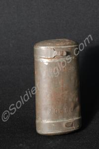 Oval metal cylinder ration tin. Marked 'Cocoa' at
