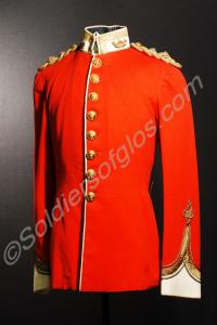 Officer's scarlet tunic with white facings. Worn b