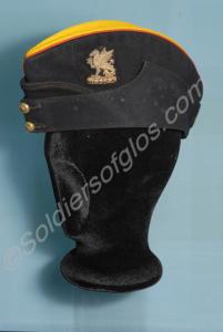 Blue cloth side hat with yellow facings and a Wess