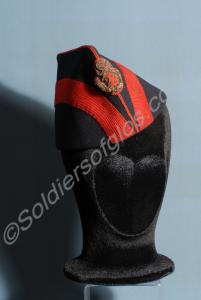 Officer's blue side cap with red braid and 23rd Mi