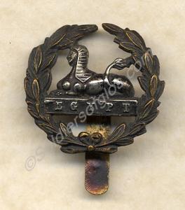 Bronze wreath with white metal sphinx back badge,
