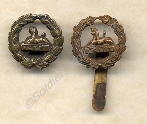 Two Other Ranks' back badges (one gilt, two brass)