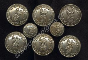 Set of six large and two small white metal Militia