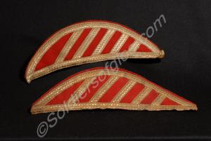 One pair of Drummers epaulette wings. Scarlet clot