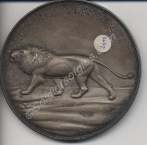 White metal medallion presented by The Army Rifle
