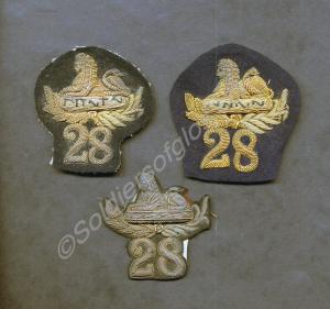 Three officers' embroidered forage cap badges.  28