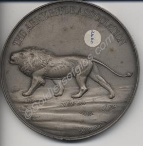 White metal medallion presented by The Army Rifle
