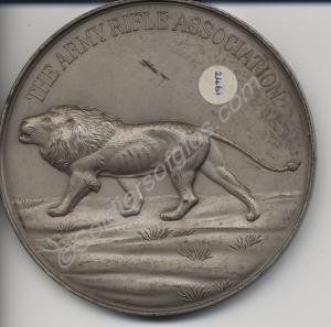 White metal medallion presented by The Army Rifle