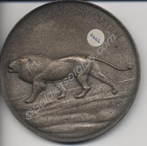 White metal medallion presented by The Army Rifle