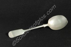 White metal spoon made by Mappin and Webb. The spo