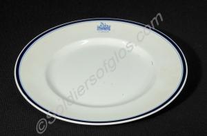 White ceramic dinner plate. Decorated with a deep