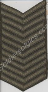 Four sets of sergeant's khaki stripes in a strip.