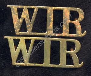 Pair of brass shoulder titles. West India Regiment
